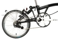 Brompton C Line Explore - 6-Speed - Mid Bar - Standard Seatpost - Rear Rack & Dynamo - 16" Folding Bike - 2022 - Black Matt 12 Brompton C Line Explore - 6-Speed - Mid Bar - Standard Seatpost - Rear Rack & Dynamo - 16" Folding Bike - 2022 - Black Matt -Fietswereld Winkels c line explore 6 speed mid bar standard seatpost black matt 5 1215496